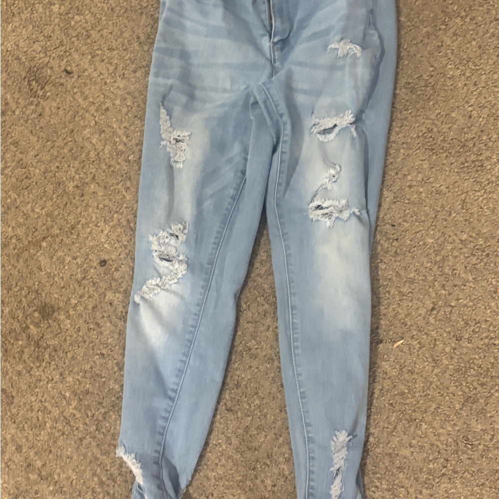 Women's Distressed Light Blue Jeans